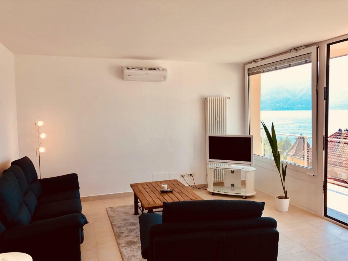 Attico Palazzo Di Vetro Apartment Луино Екстериор снимка